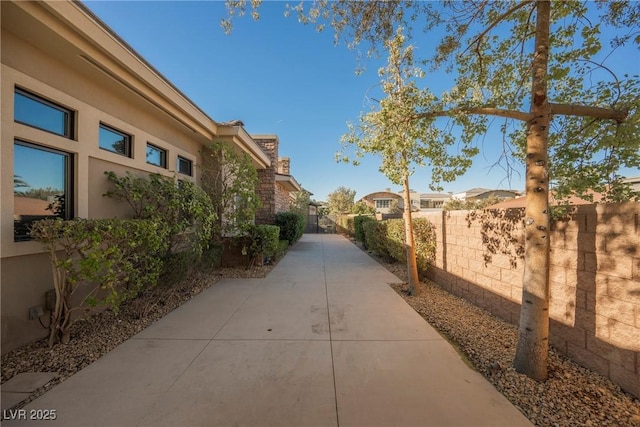 view of property's community with fence