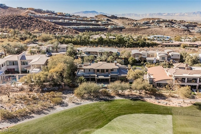 birds eye view of property with a residential view and a mountain view