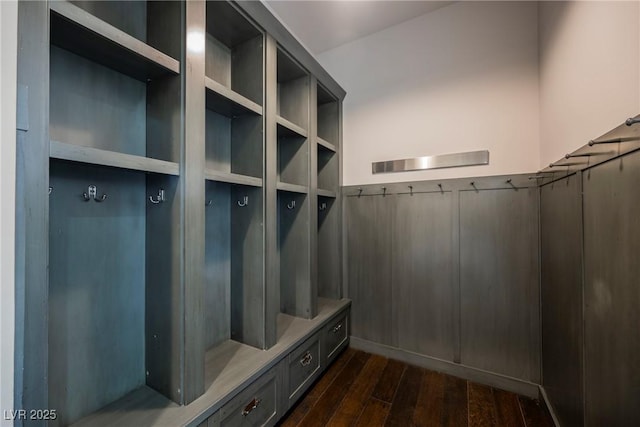 mudroom with dark wood finished floors