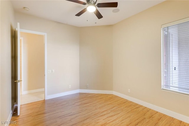 unfurnished room featuring ceiling fan and light hardwood / wood-style flooring