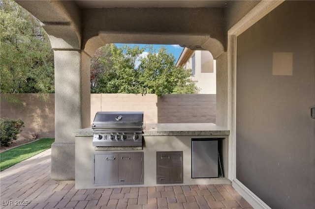 view of patio / terrace featuring area for grilling and grilling area