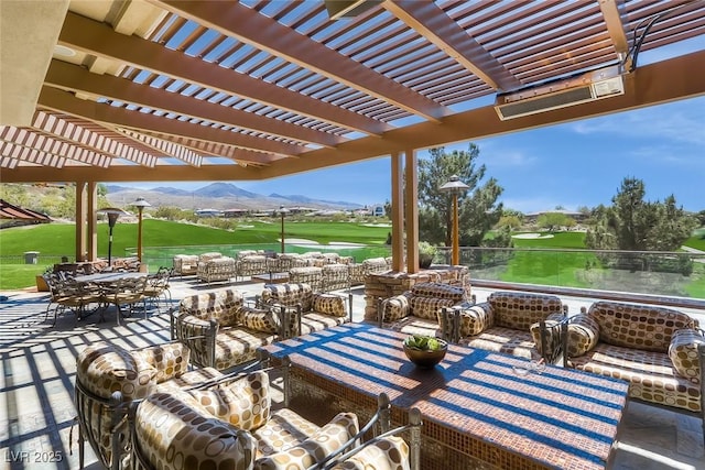 view of patio / terrace with a mountain view and a pergola