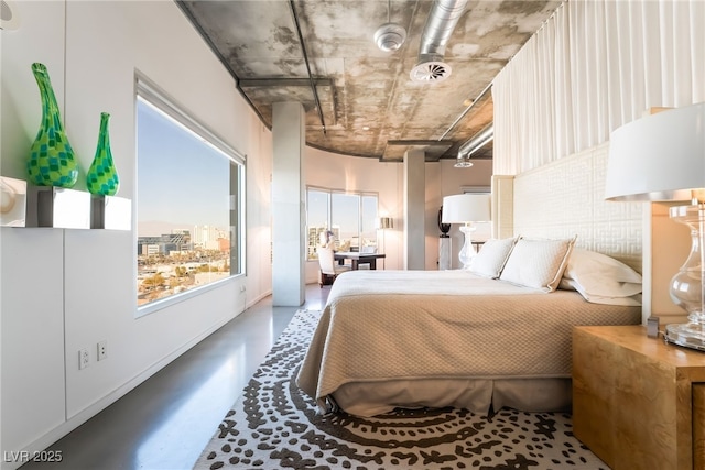 bedroom with concrete floors