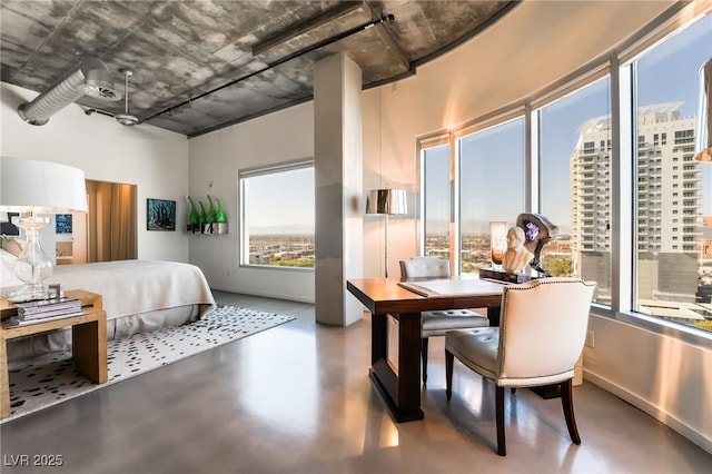 bedroom with concrete flooring