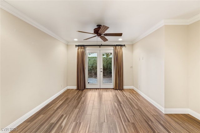 unfurnished room featuring french doors, wood-type flooring, and crown molding