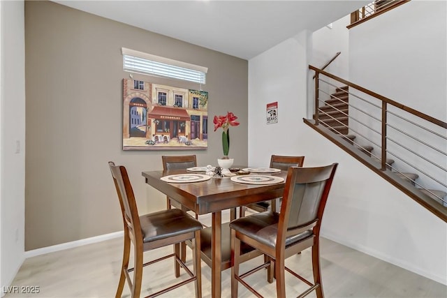 dining room featuring light wood-type flooring