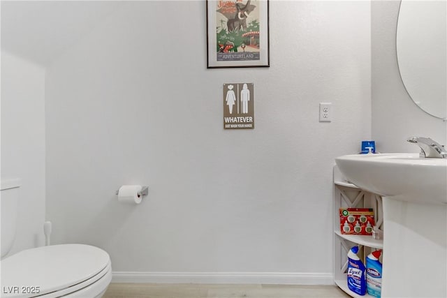 bathroom featuring toilet