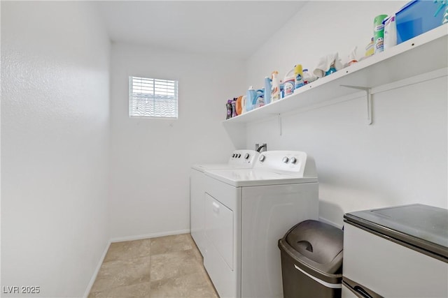 clothes washing area with independent washer and dryer