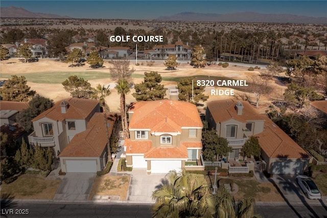 bird's eye view featuring a residential view and a mountain view