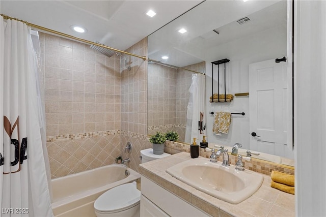 full bath featuring shower / tub combo, visible vents, toilet, vanity, and recessed lighting