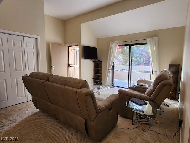 3800 Desert Marina Dr Unit 160, Laughlin, NV 89029 - living room featuring light carpet and lofted ceiling