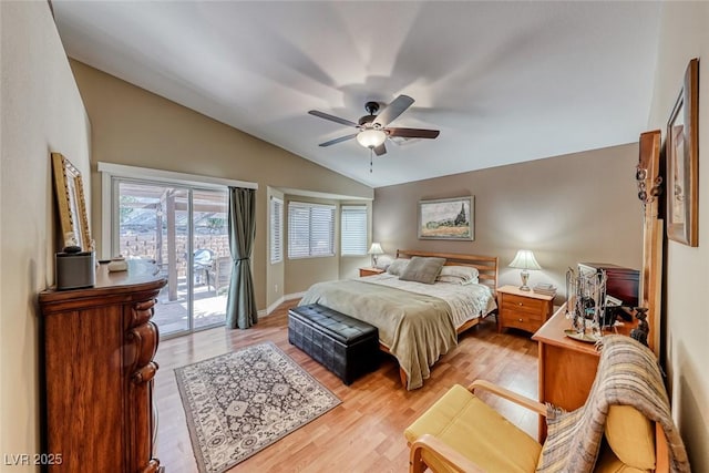 bedroom featuring ceiling fan, lofted ceiling, light hardwood / wood-style floors, and access to outside