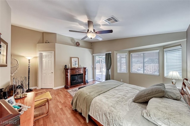 bedroom featuring wood-type flooring and ceiling fan