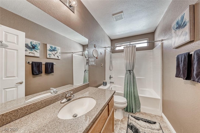 full bathroom with vanity, toilet, shower / tub combo, and a textured ceiling