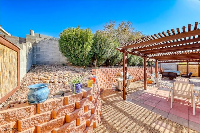 view of patio featuring a pergola