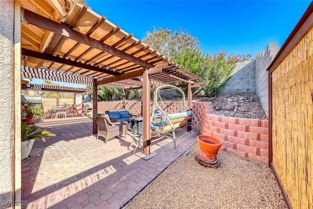 view of patio / terrace with an outdoor living space and a pergola