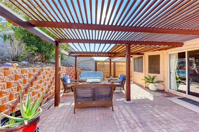 view of patio / terrace with an outdoor hangout area and a pergola