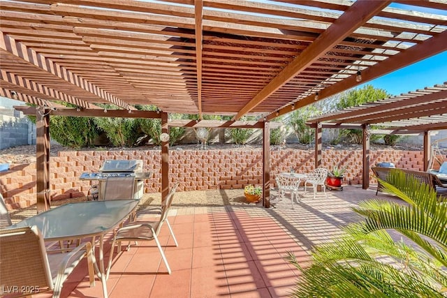 view of patio / terrace with a grill and a pergola