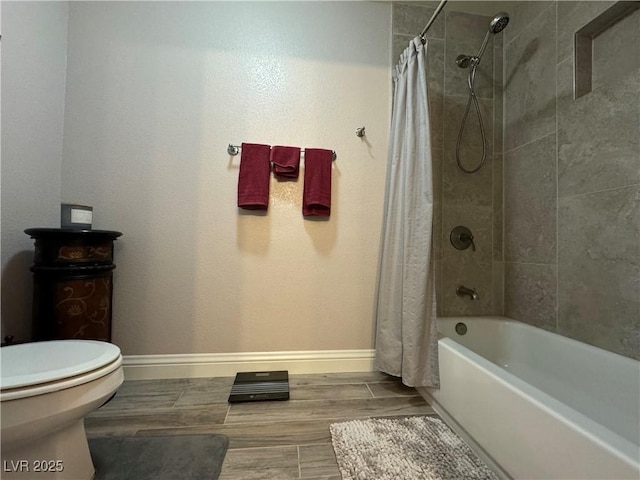 bathroom with toilet and shower / bathtub combination with curtain