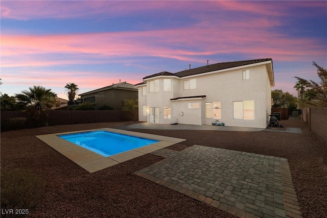 view of pool with a fenced backyard, a fenced in pool, and a patio