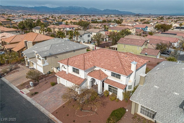 aerial view featuring a residential view and a mountain view