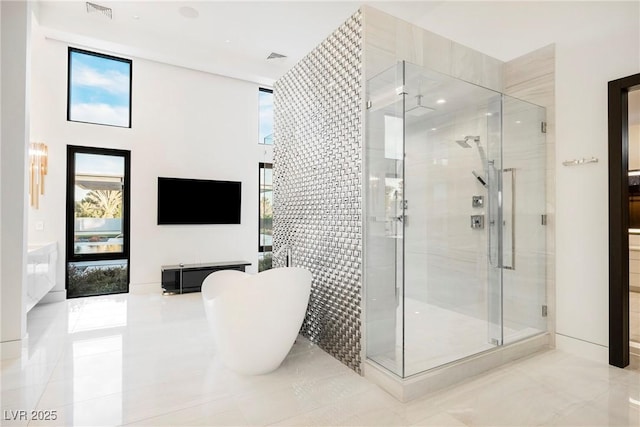 bathroom featuring plus walk in shower