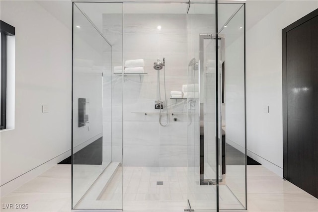 bathroom featuring an enclosed shower