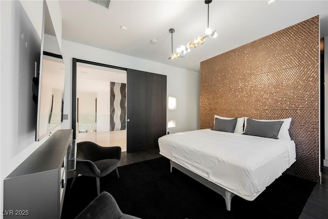 bedroom featuring dark wood-type flooring