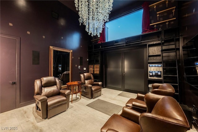 home theater with a towering ceiling