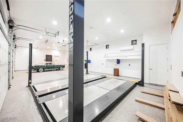 garage with a wall mounted AC