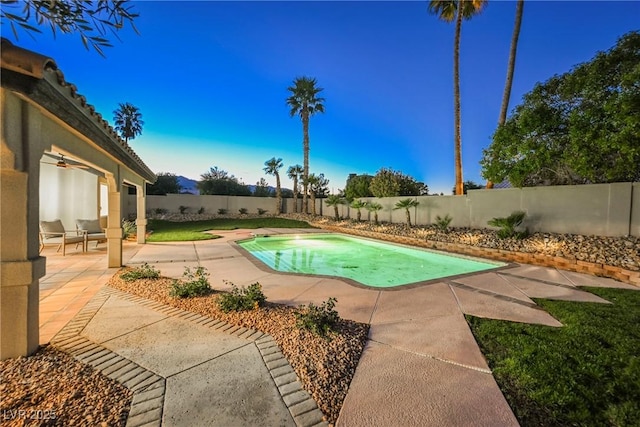 view of swimming pool featuring a patio area