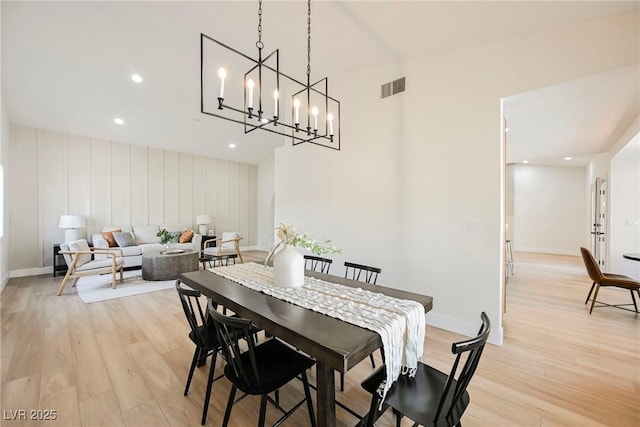 dining space with light wood-type flooring