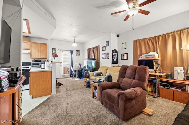 living room featuring light colored carpet and ceiling fan