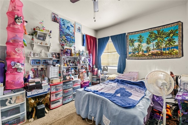 carpeted bedroom with ceiling fan