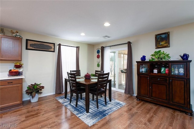 dining room featuring hardwood / wood-style flooring