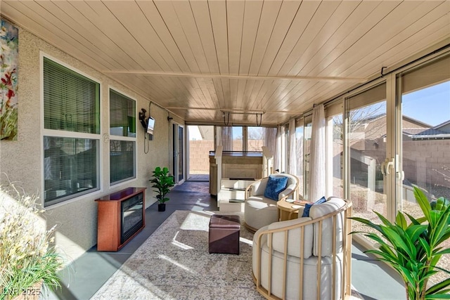 sunroom / solarium with wood ceiling