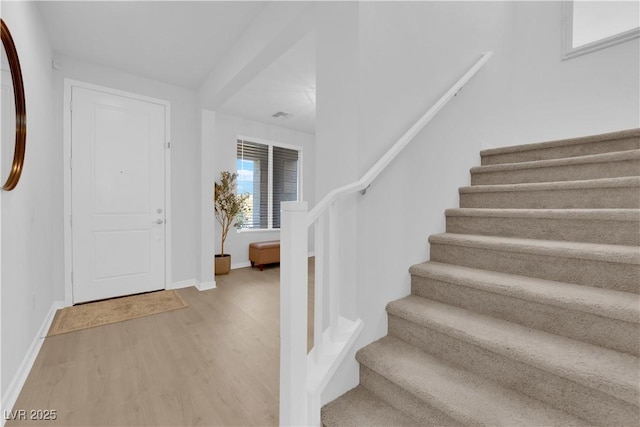 foyer featuring hardwood / wood-style floors