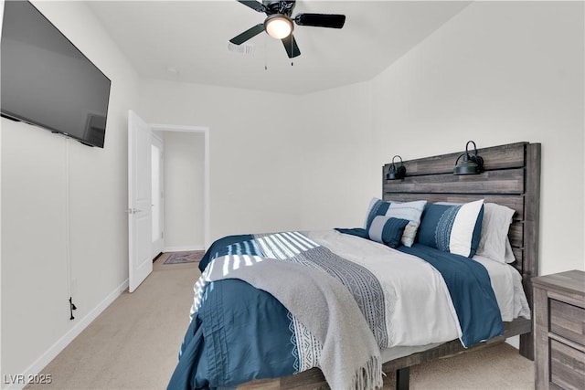 bedroom with light carpet and ceiling fan