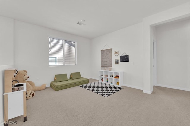 sitting room featuring carpet