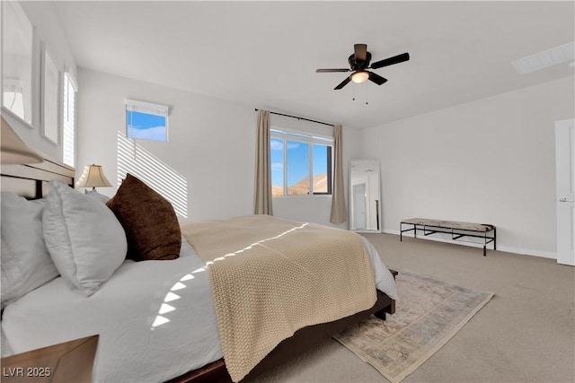 carpeted bedroom featuring ceiling fan