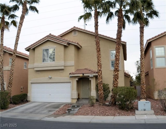 view of front of property with a garage