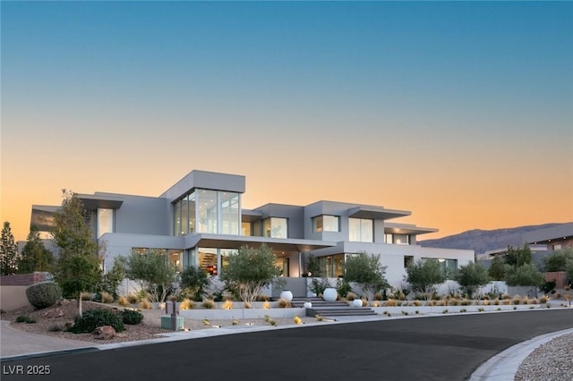 contemporary house featuring a mountain view