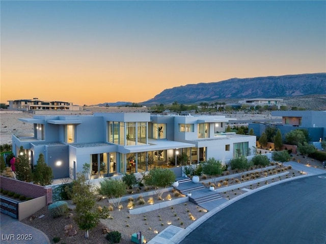 view of front of house featuring a mountain view