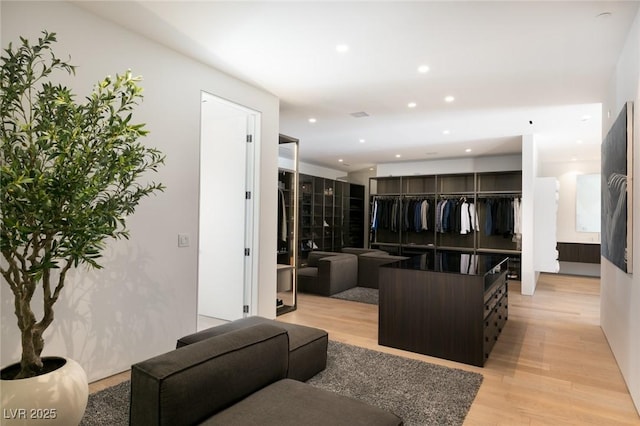 living room with light hardwood / wood-style floors