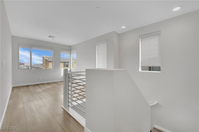 hall featuring light hardwood / wood-style flooring