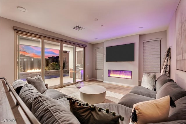 living room featuring light wood-type flooring