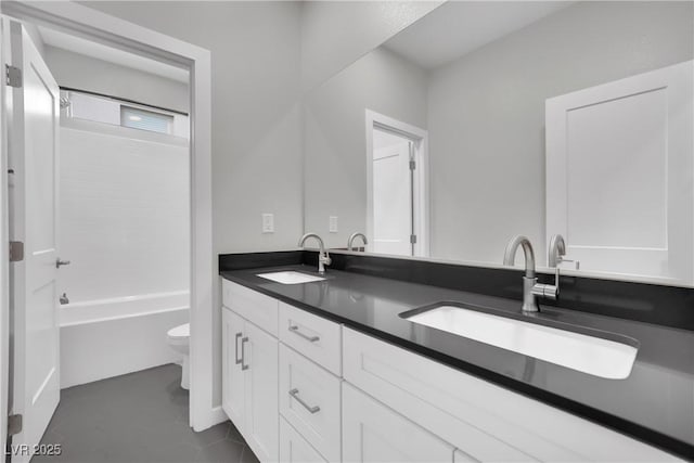 full bathroom with vanity, shower / tub combination, tile patterned floors, and toilet