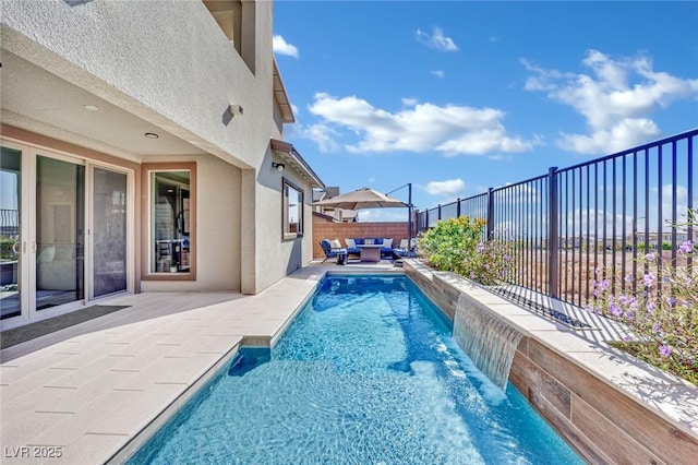 view of pool featuring a patio and pool water feature