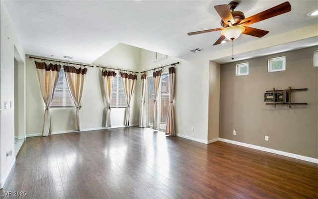 unfurnished room featuring dark hardwood / wood-style flooring and ceiling fan