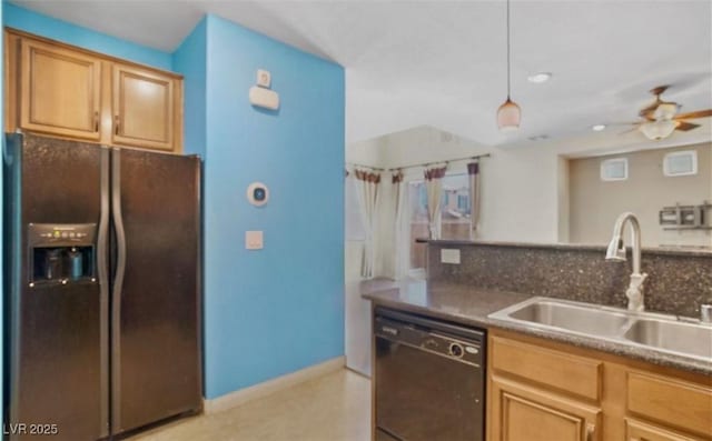 kitchen featuring sink, decorative light fixtures, black appliances, and ceiling fan